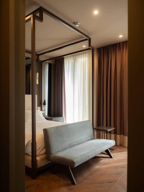 Suite, 1 King Bed | Minibar, in-room safe, iron/ironing board, free WiFi