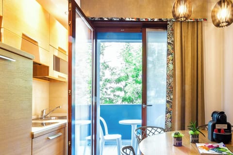 Deluxe Condo, 2 Bedrooms | Private kitchen | Fridge, microwave, stovetop, dishwasher