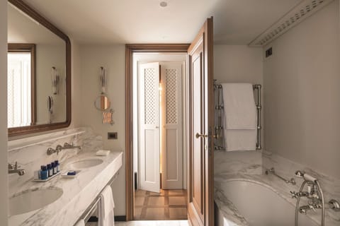 Junior Suite, Balcony, Sea View | Bathroom | Rainfall showerhead, hair dryer, bathrobes, slippers