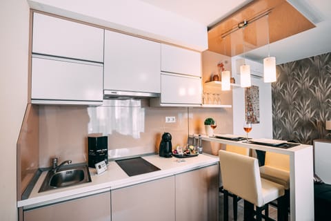 Junior Suite, Balcony | Private kitchenette | Electric kettle