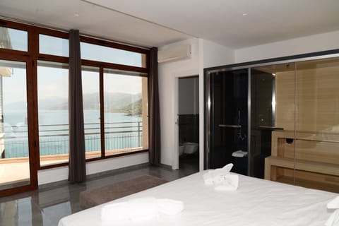 Suite with Sauna, Sea View | Premium bedding, in-room safe, desk, rollaway beds