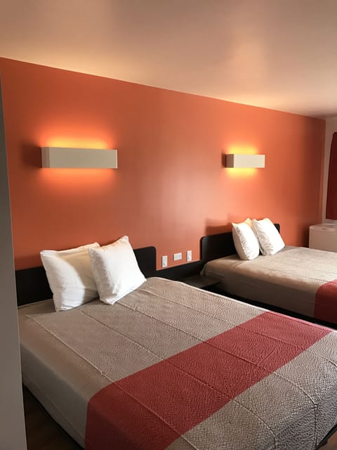 Deluxe Room, 2 Queen Beds, Non Smoking, Refrigerator & Microwave | Free WiFi, bed sheets