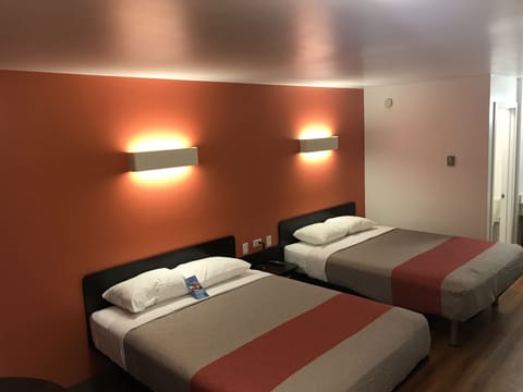 Deluxe Room, 2 Queen Beds, Non Smoking, Refrigerator & Microwave | Free WiFi, bed sheets