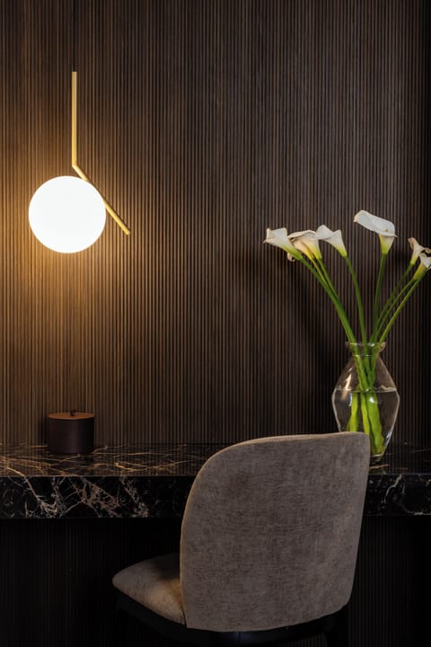 Hypo-allergenic bedding, down comforters, minibar, in-room safe