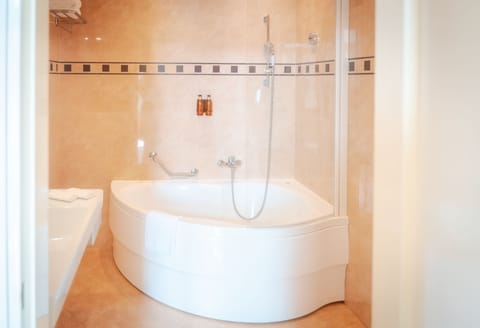 Suite, Balcony, Sea View | Bathroom | Bathtub, free toiletries, hair dryer, towels