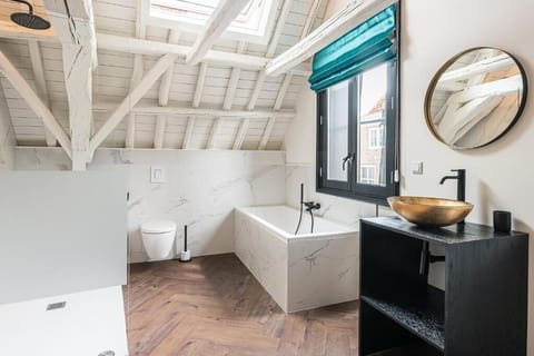 Junior Studio Suite, City View | Bathroom | Separate tub and shower, hair dryer, bathrobes, slippers