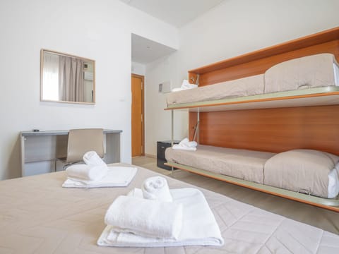 Quadruple Room, Balcony | In-room safe, laptop workspace, travel crib, free WiFi