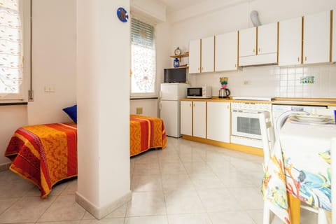 Apartment | Private kitchen | Fridge, microwave, stovetop, espresso maker