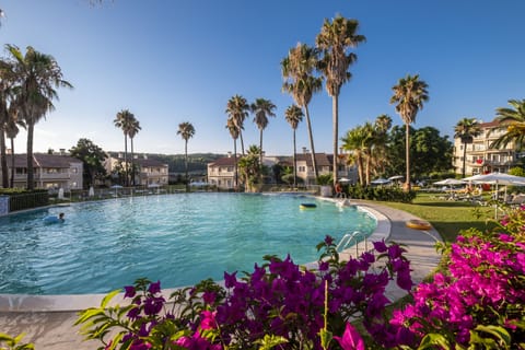 2 outdoor pools, sun loungers