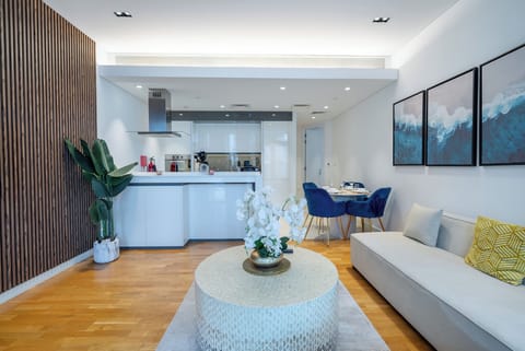 Deluxe Apartment, Balcony, Courtyard View | Living area | 55-inch Smart TV with digital channels