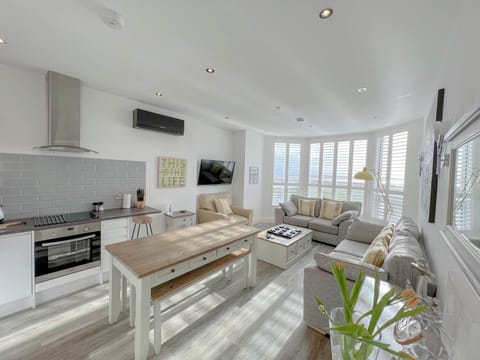 Luxury Apartment, Sea View | Living area | 40-inch Smart TV with digital channels, Netflix, streaming services