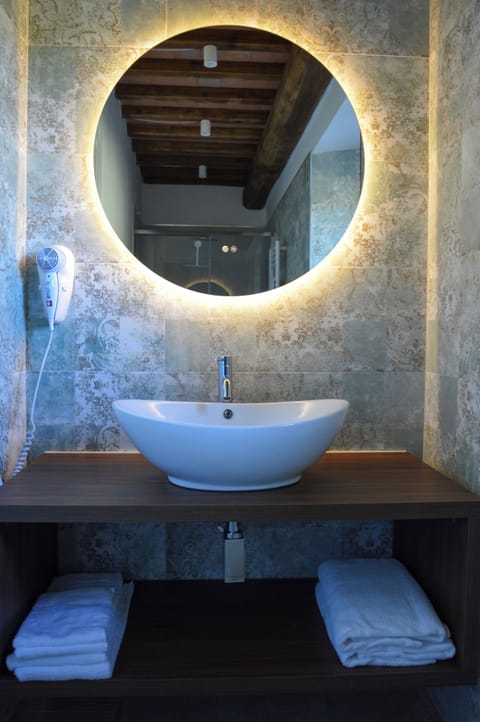 Apartment, Lake View | Bathroom | Hair dryer, towels, soap, toilet paper