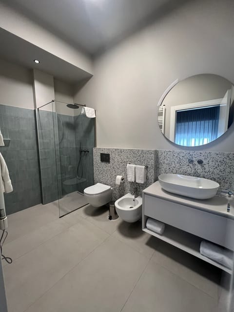 Panoramic Double or Twin Room, City View | Bathroom | Shower, hair dryer, slippers, towels