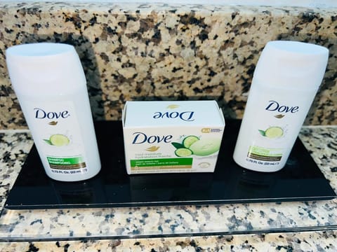 Room, 1 King Bed, Non Smoking | Bathroom | Hair dryer, towels, soap, shampoo