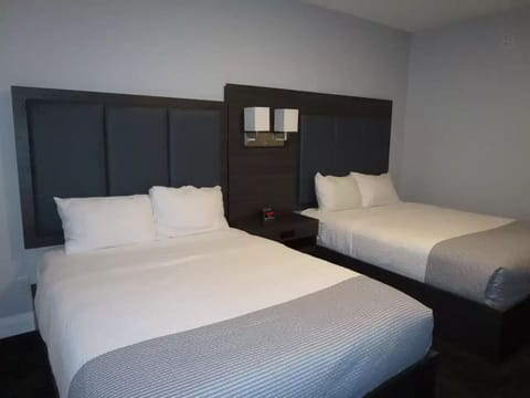 Room, Multiple Beds, Non Smoking | Free WiFi, bed sheets, alarm clocks