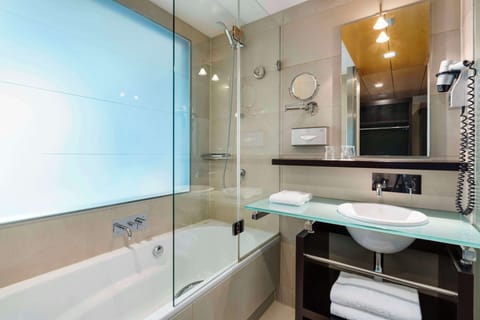 Combined shower/tub, eco-friendly toiletries, hair dryer, towels