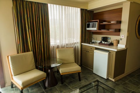 Suite, Balcony | Living area | 32-inch LCD TV with cable channels, TV