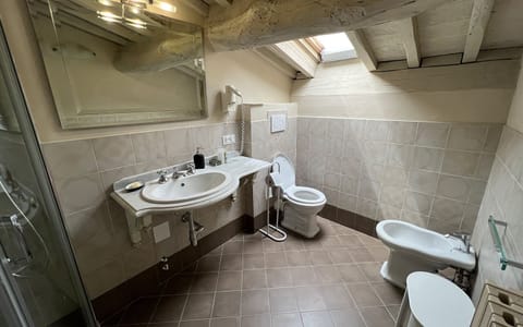 Economy Double or Twin Room | Bathroom | Shower, free toiletries, hair dryer, slippers