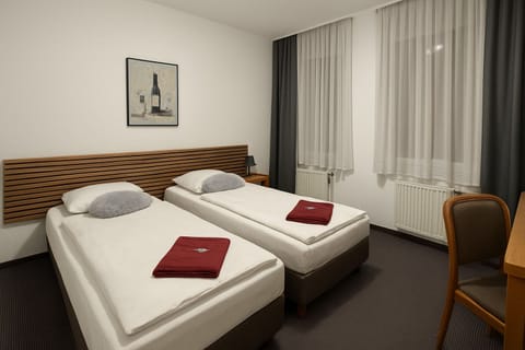Classic Double or Twin Room, City View | Hypo-allergenic bedding, desk, laptop workspace, free WiFi