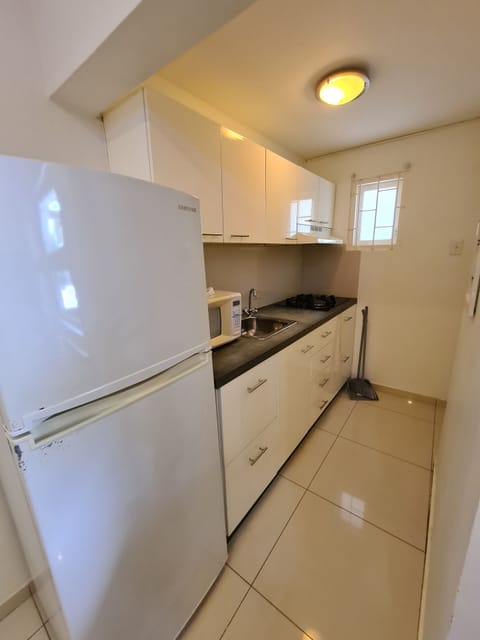 Comfort Studio | Private kitchen | Full-size fridge, microwave, stovetop, coffee/tea maker