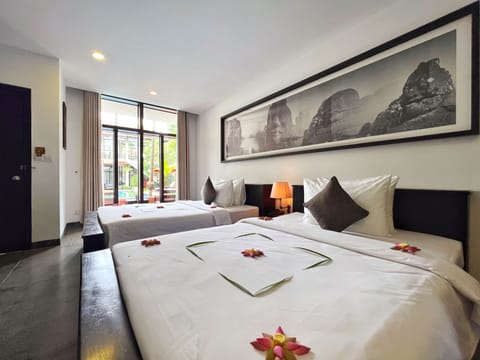 Deluxe Twin Room, 2 Double Beds, Poolside | In-room safe, laptop workspace, soundproofing, iron/ironing board