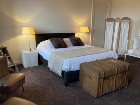 Blackout drapes, iron/ironing board, travel crib, free WiFi