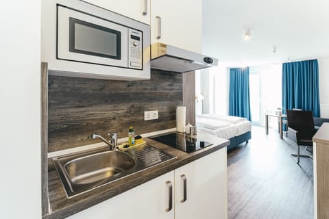 Superior Apartment Cathedral View | Private kitchenette | Full-size fridge, microwave, stovetop, espresso maker