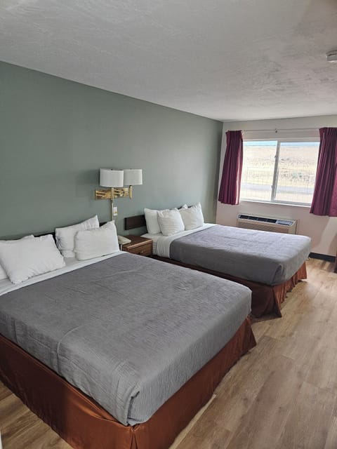 Standard Room, 2 Queen Beds | Desk, blackout drapes, iron/ironing board, free WiFi