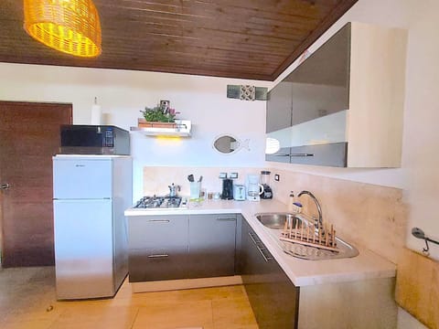 Deluxe Apartment, Accessible, Private Bathroom (APARTAMENTO 2) | Private kitchen | Fridge, microwave, espresso maker, coffee/tea maker