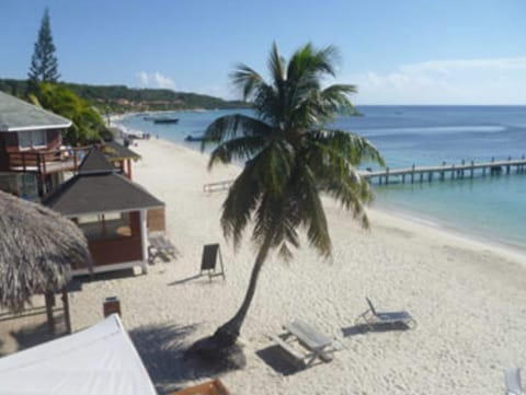 On the beach, white sand, beach massages, beach bar