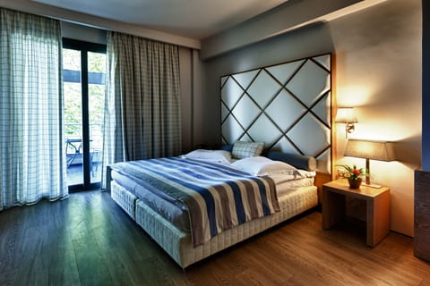 Standard Triple Room, 1 Bedroom | Minibar, in-room safe, soundproofing, free WiFi