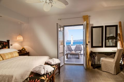 Senior Suite, Sea View | Minibar, in-room safe, soundproofing, iron/ironing board