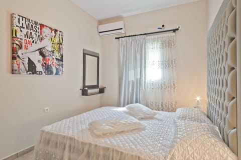 Luxury Apartment, Sea View, Ground Floor (Village View) | Iron/ironing board, cribs/infant beds, bed sheets