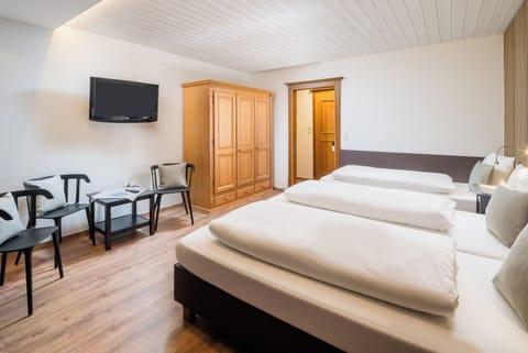 Economy Triple Room, Balcony, Mountain View | Hypo-allergenic bedding, free WiFi, bed sheets