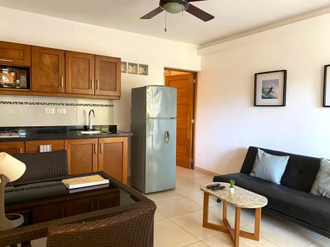 Standard Apartment, 1 Bedroom, Garden View | Living area | Flat-screen TV