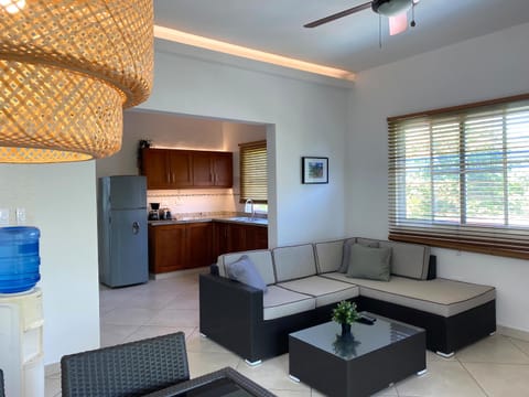 Deluxe Apartment, 1 Bedroom, Pool View | Living area | Flat-screen TV