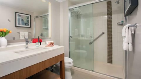 Room, Multiple Beds, Pool View | Bathroom | Combined shower/tub, designer toiletries, hair dryer, towels