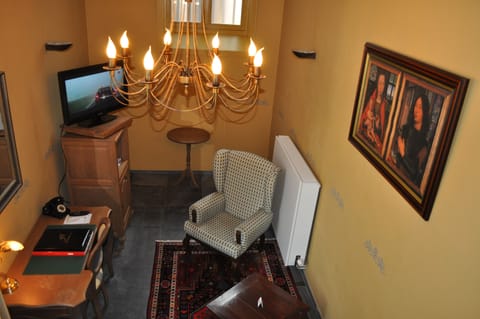 Deluxe Duplex, 1 Bedroom | Living area | 32-inch Smart TV with satellite channels, TV