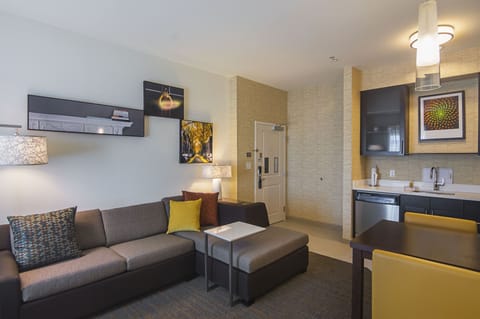 Suite, 1 Bedroom | Living area | 32-inch Smart TV with satellite channels, TV, Netflix