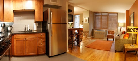 Premier Suite, Multiple Beds | Private kitchen | Fridge, microwave, oven, stovetop