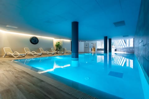 Indoor pool, seasonal outdoor pool, sun loungers