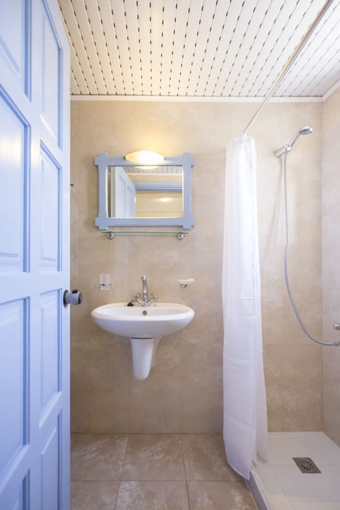 Studio, Pool View | Bathroom | Shower, hair dryer, towels