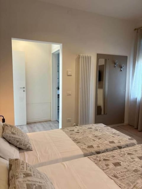 Deluxe Double or Twin Room | Desk, laptop workspace, blackout drapes, free WiFi