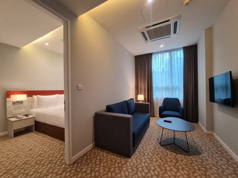 Suite, 1 Bedroom (with Living Area) | In-room safe, desk, blackout drapes, iron/ironing board