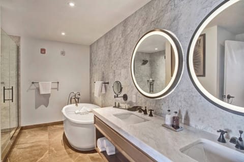 Designer toiletries, hair dryer, bathrobes, slippers