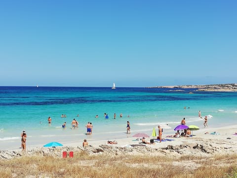 On the beach, white sand