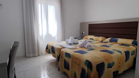 Economy Double Room (No Balcony) | Blackout drapes, free WiFi, bed sheets