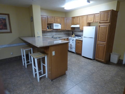 Condo, 2 Bedrooms | Private kitchen | Fridge, microwave