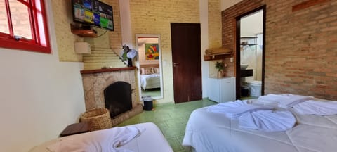 Suites De La Sierra Plus Tripla (com Lareira) | Premium bedding, minibar, individually decorated, free WiFi