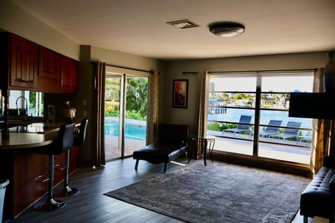 Deluxe House, Multiple Beds, Private Pool, Canal View | Living area | Flat-screen TV